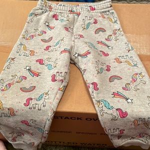 Unicorn sweatshirt and matching sweatpants.